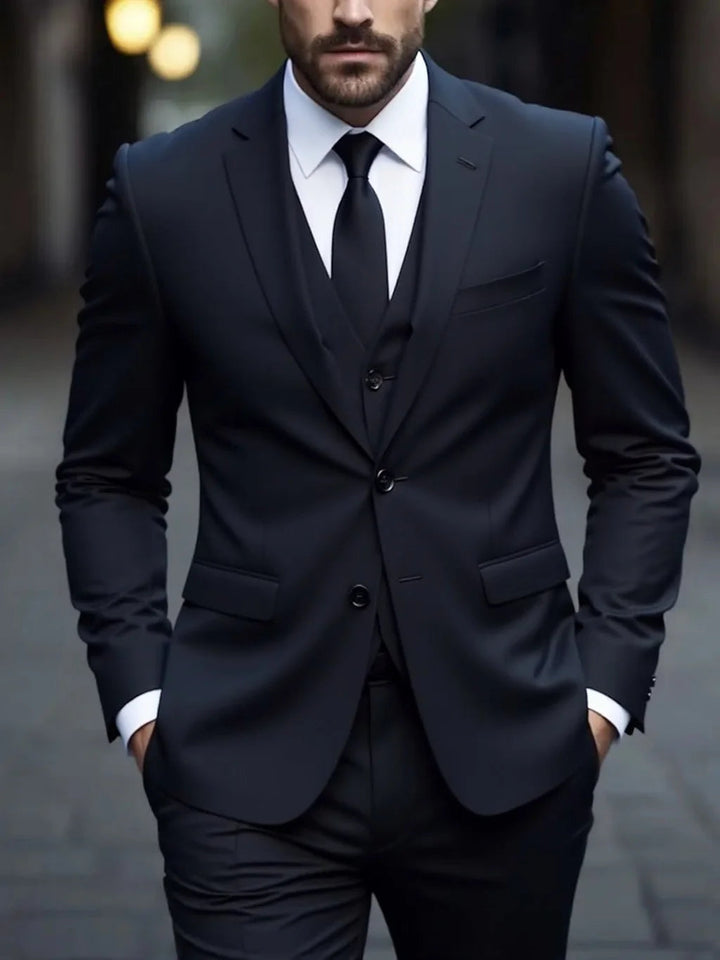 Navy double-breasted three-piece formal suit with notch lapels and vest