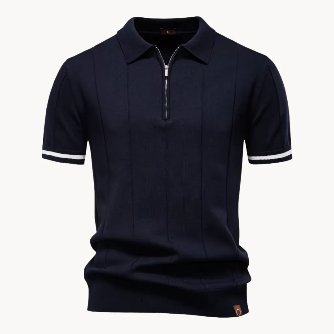 Navy blue knit polo shirt with quarter zip and white sleeve trim