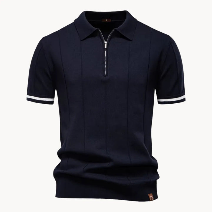 Navy blue knit polo shirt with quarter zip and white sleeve trim