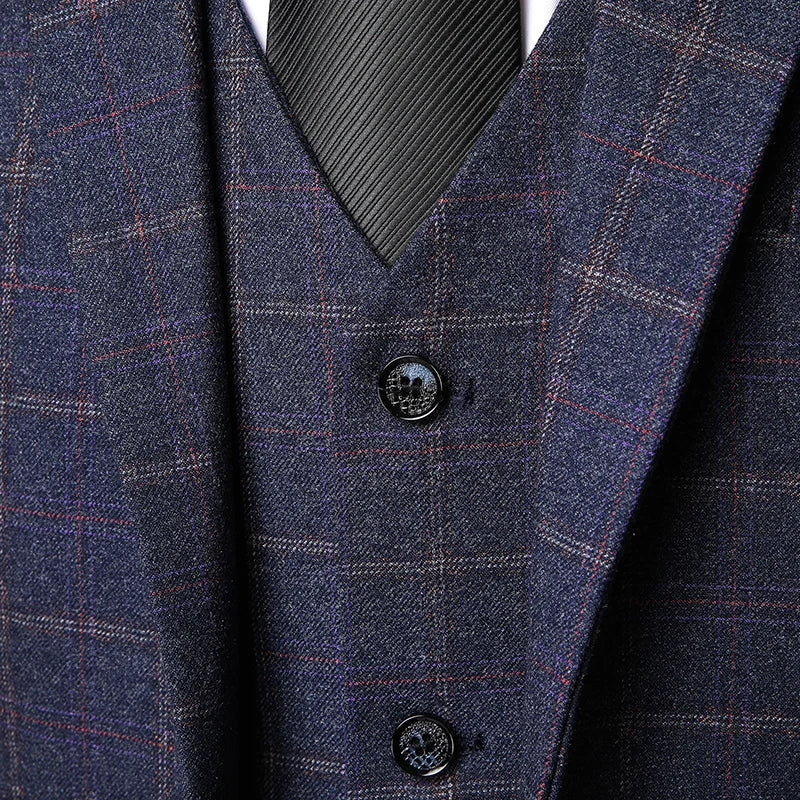 Navy plaid vest detail showing button closure and tailored fit