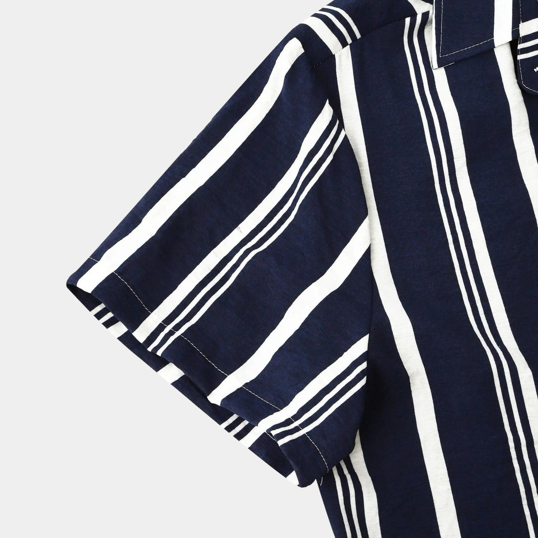 Rolled short sleeve cuff detail on navy striped button-up shirt