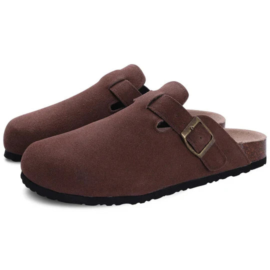 Pair of dark brown suede-like cork buckle slide slippers with dark soles