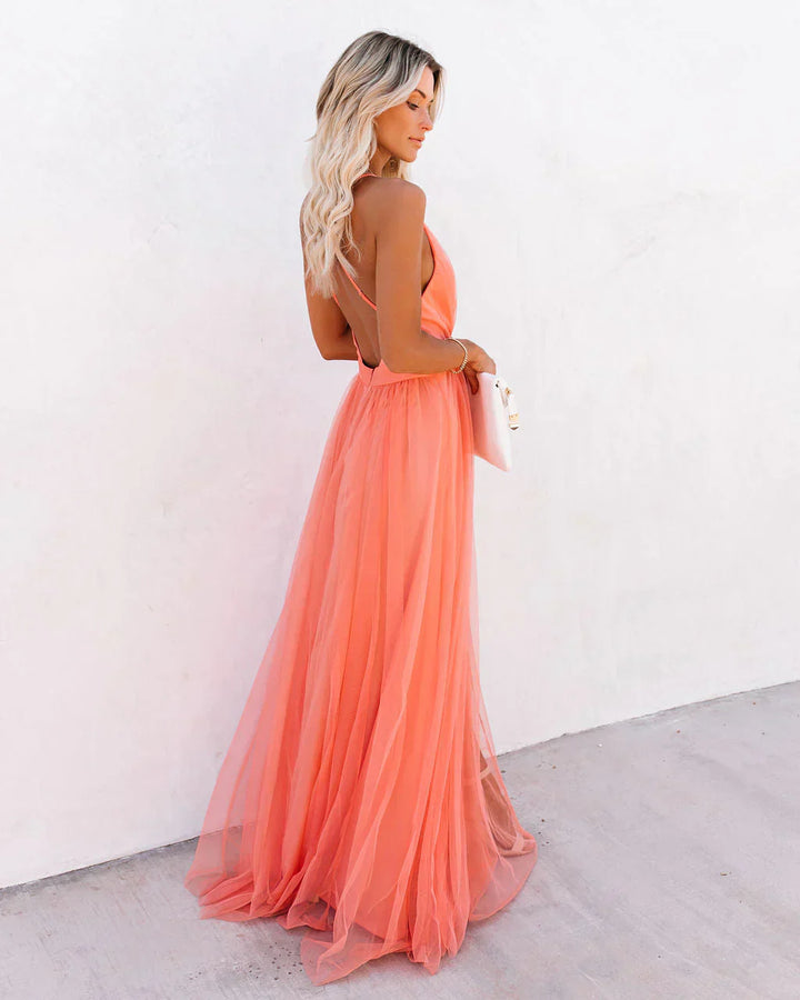 Women peach backless spaghetti strap maxi dress, side body view