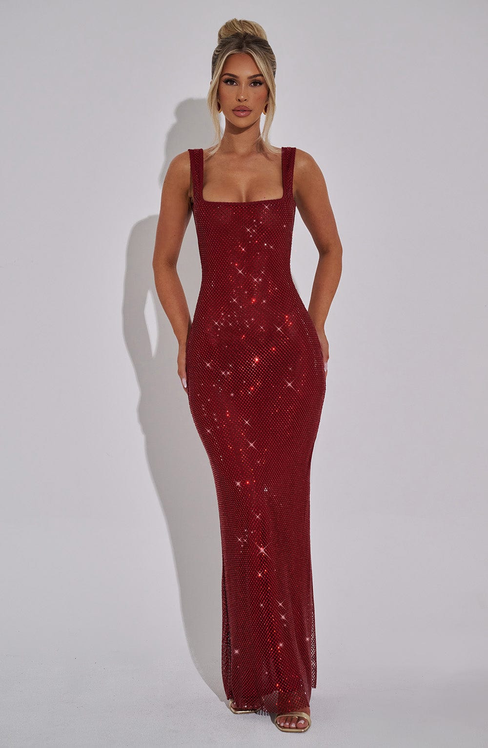 Women red sequin maxi party dress with square neckline and wide shoulder straps, front view.