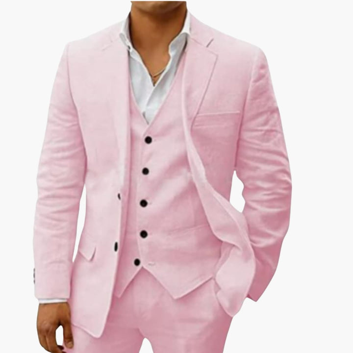 Pink formal three-piece suit with blazer, vest, and matching trousers