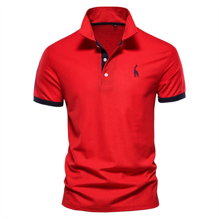 Red short-sleeved polo shirt with navy blue collar and sleeve cuff bands