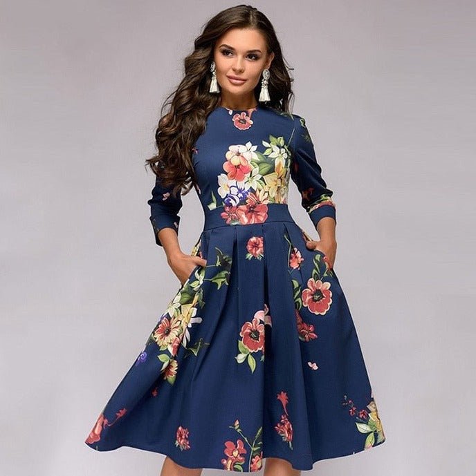 Women navy floral midi dress with colorful floral print, round neck, three-quarter sleeves, and side pockets.