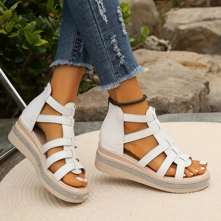 White rhinestone platform sandal with multiple straps, side angle view