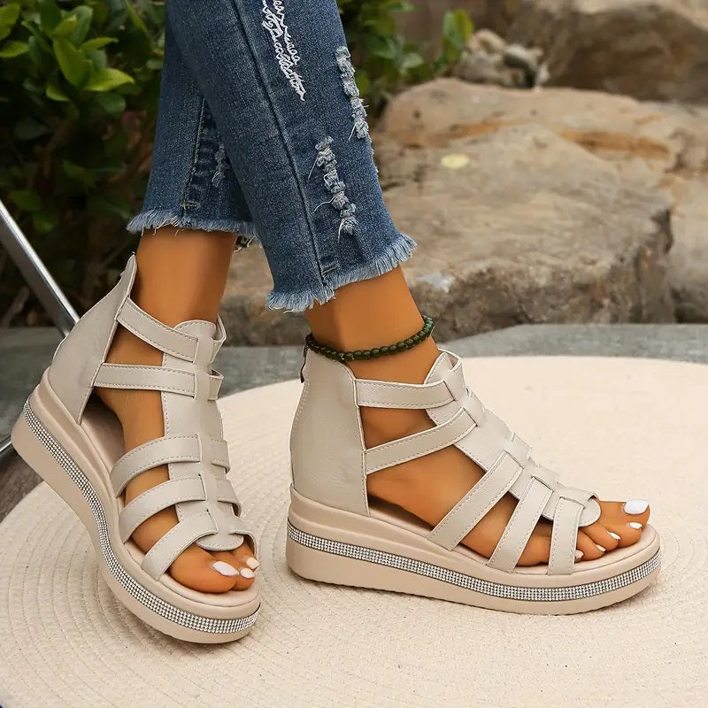Beige strappy platform sandals with rhinestone trim and thick cushioned sole