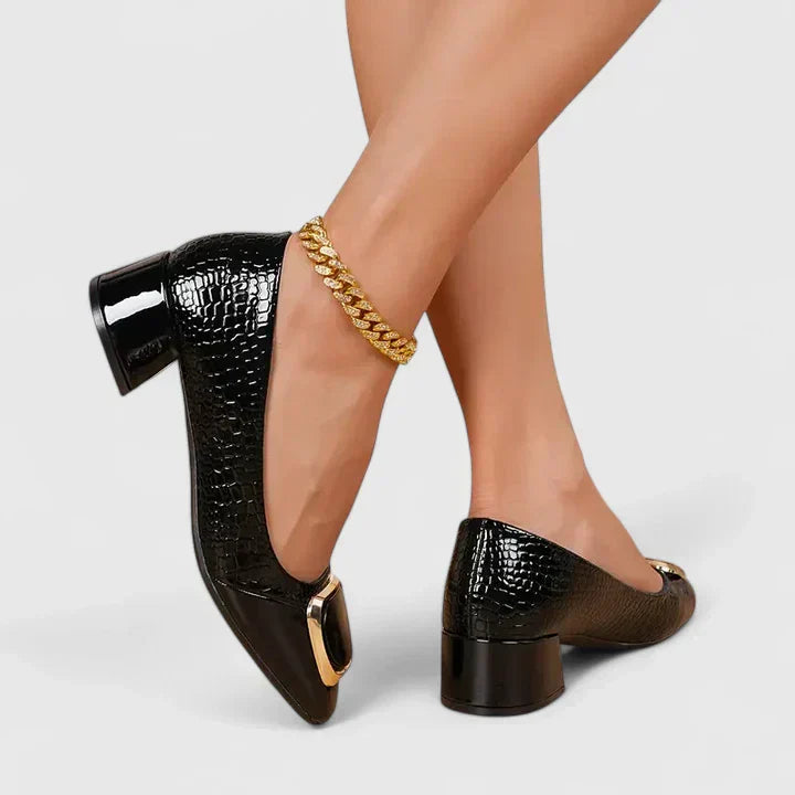 Black crocodile embossed block heel loafers with metallic gold detail