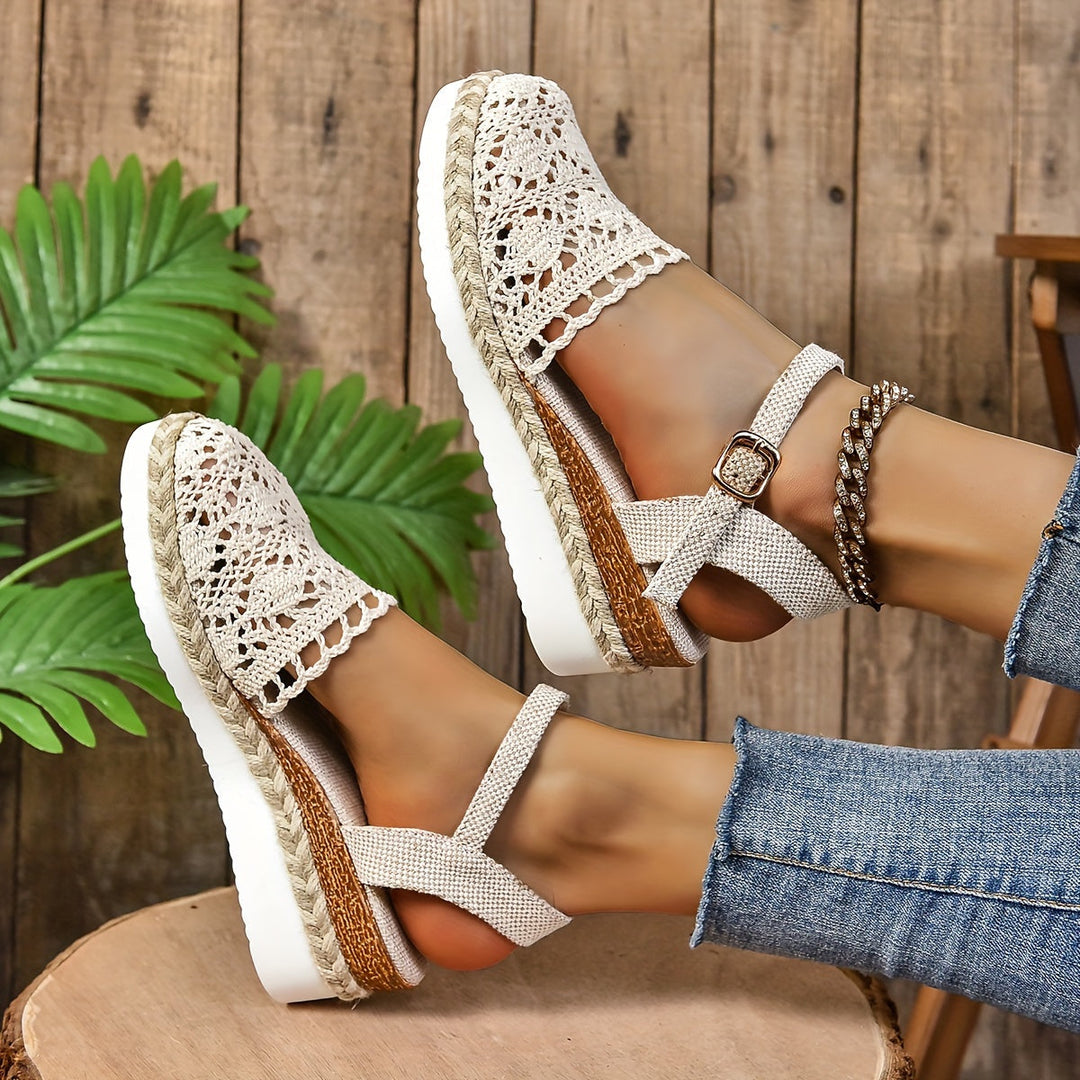 Cream crochet lace sandal with adjustable ankle strap and rope espadrille sole