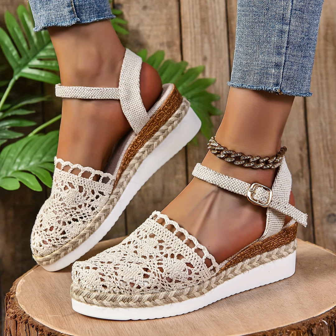 Cream crochet lace sandal with adjustable ankle strap and brown rope trim