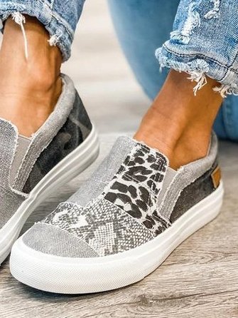 Canvas slip-on sneaker with leopard and snake print panels in neutral tones