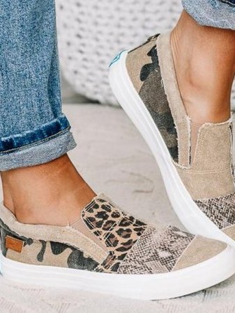 Beige canvas sneakers with leopard and animal print panels and white sole detail