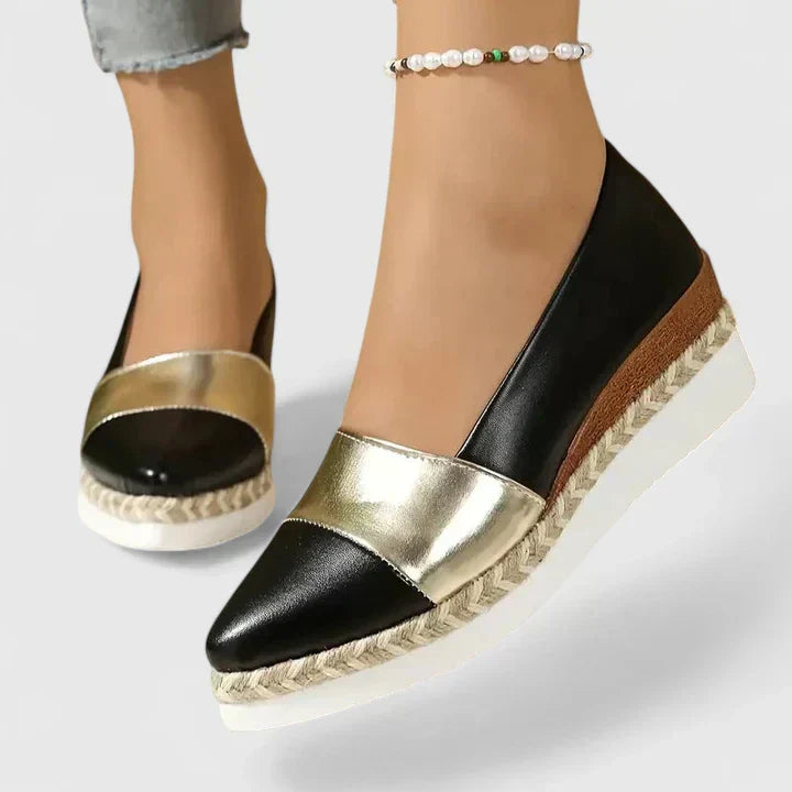 Black and gold metallic espadrille loafers with pointed toe and rope sole