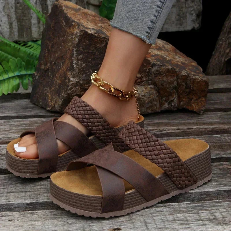 Brown suede crossover strap platform sandal with woven detail and wooden sole