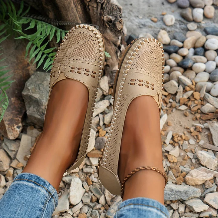 Beige moc toe loafer flats with perforated upper and scalloped edge detail