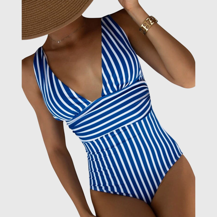 Royal blue and white striped v-neck one-piece swimsuit with gathered detail