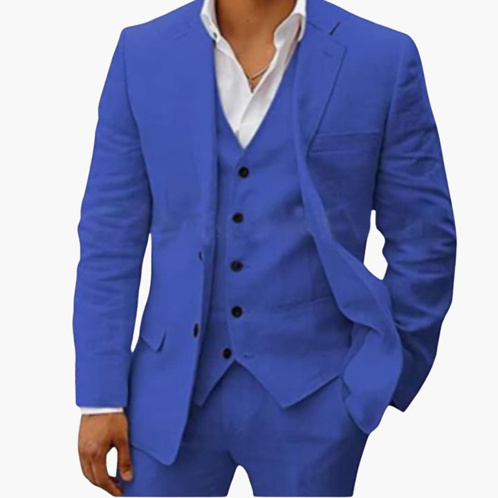 Royal blue three-piece suit with tailored blazer, vest, and dress pants