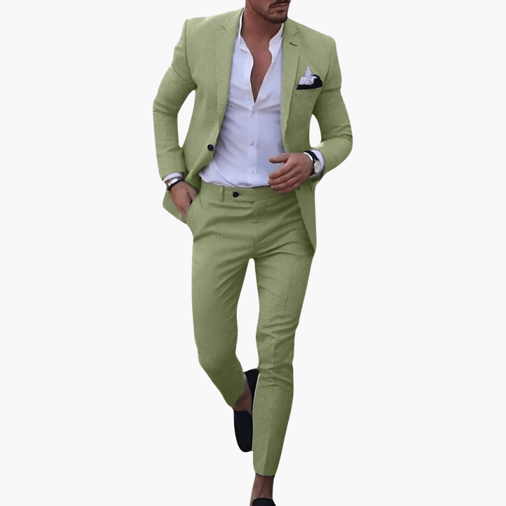 Sage green single-breasted suit with notched lapels and white shirt