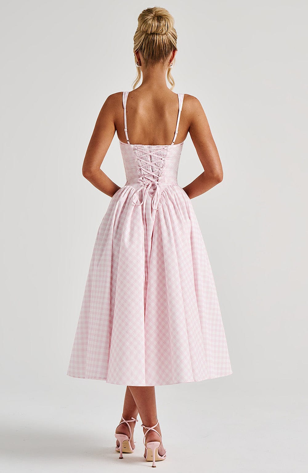 Women pink gingham midi dress back view showing lace-up closure and gathered skirt
