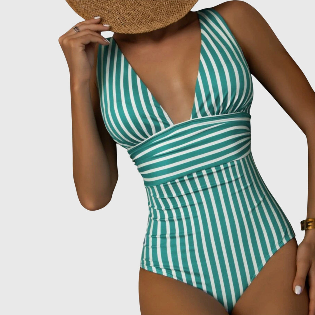 Teal and white striped v-neck one-piece swimsuit with wrapped waist band