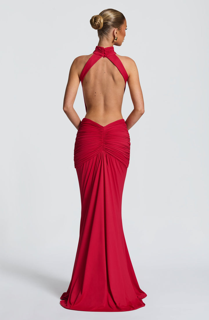 Women red backless maxi dress with ruched detailing on the lower back, full body view from behind