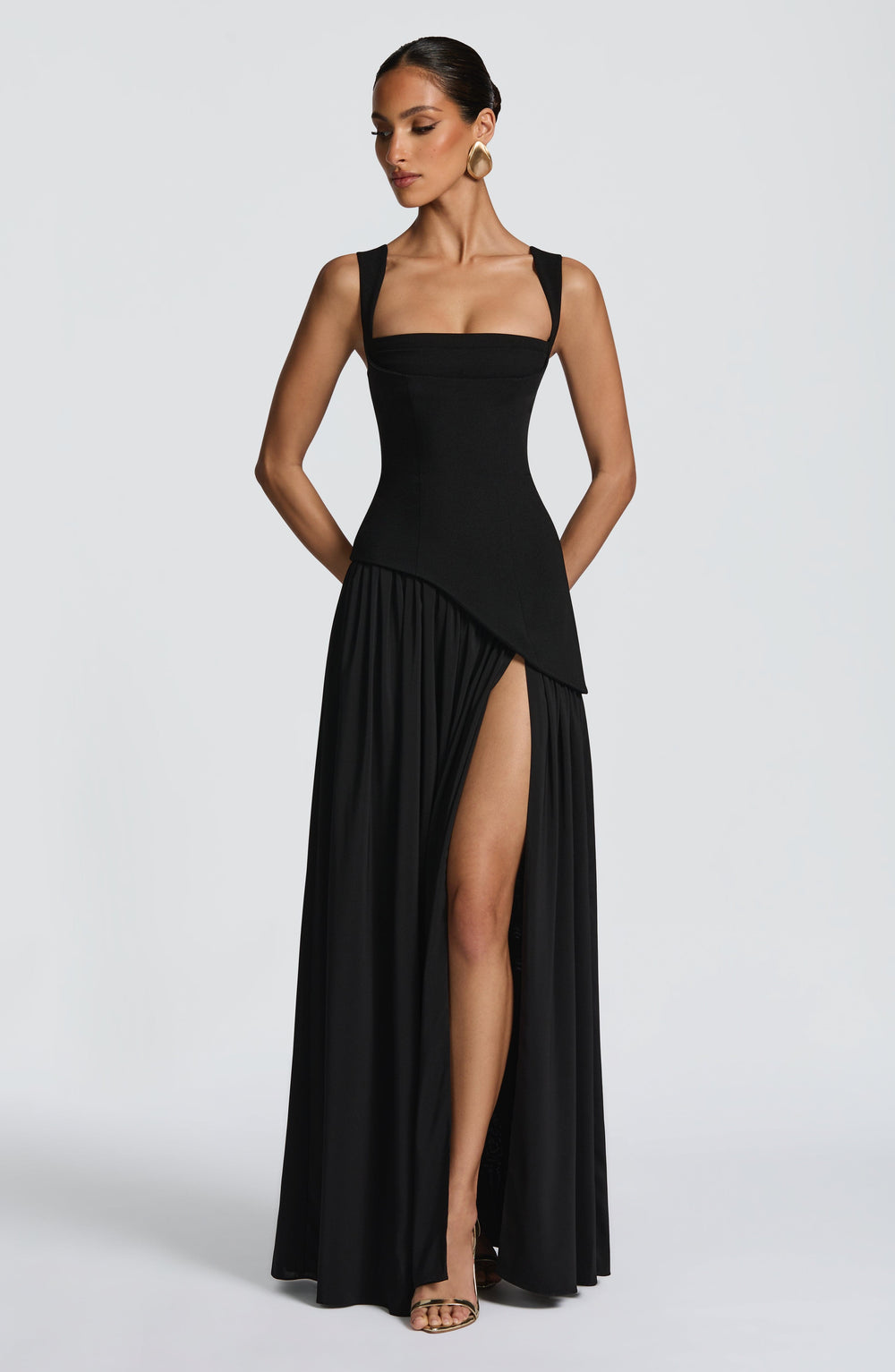 Women black square neck slit maxi dress front view with hands behind back