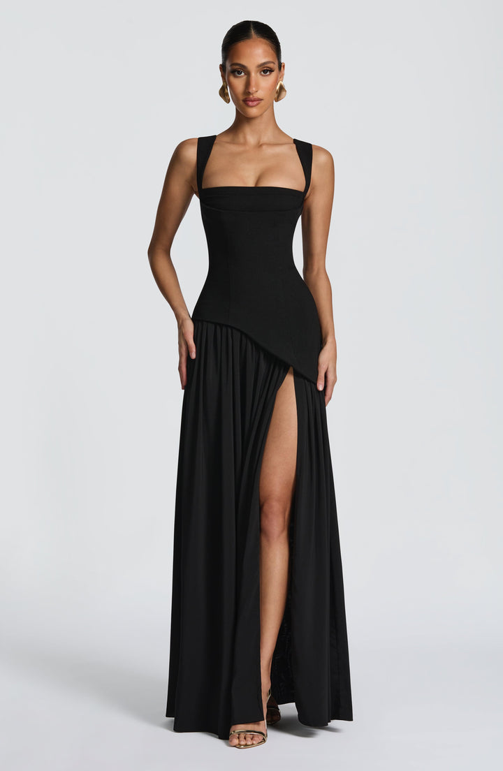 Women black formal maxi dress with square neck and high side slit, shown from front without scarf