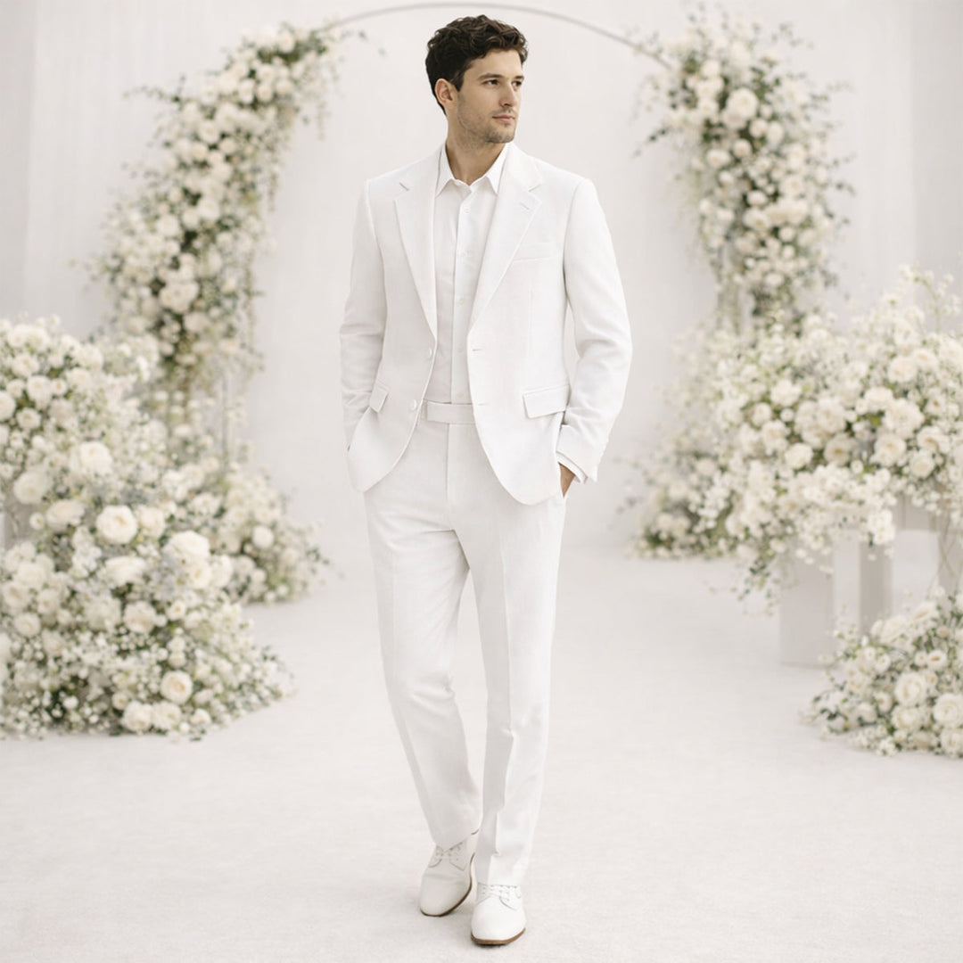 White linen suit man with white shirt in formal wedding attire