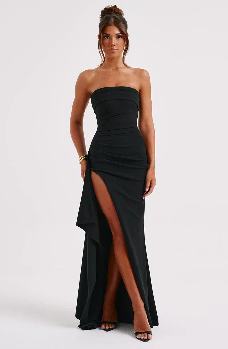 Women black strapless maxi dress with high side slit and pleated detail, front view